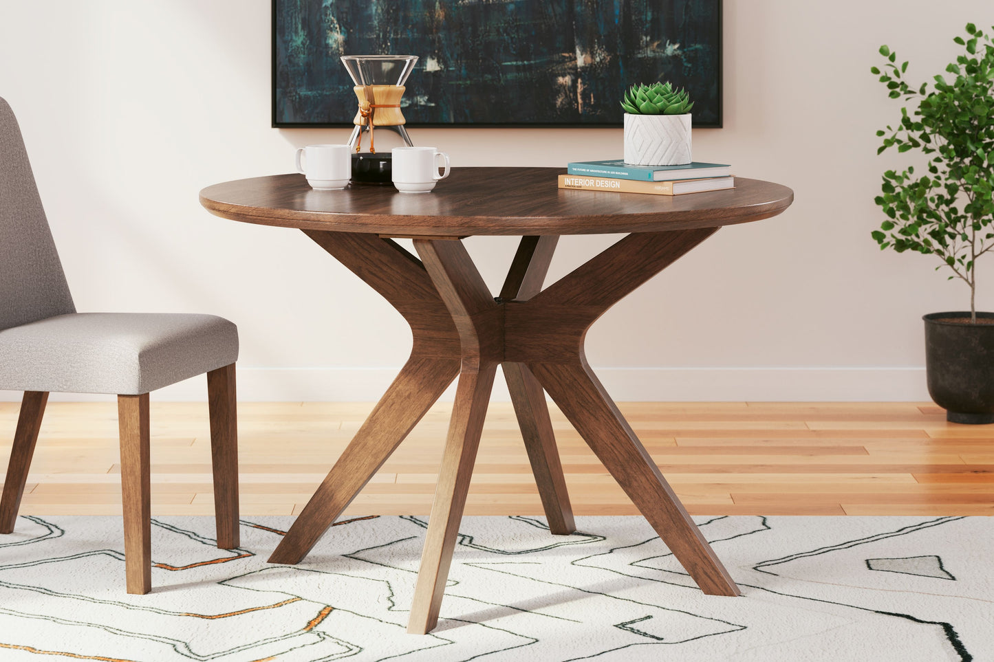 Lyncott - Round Dining Room Table - Brown